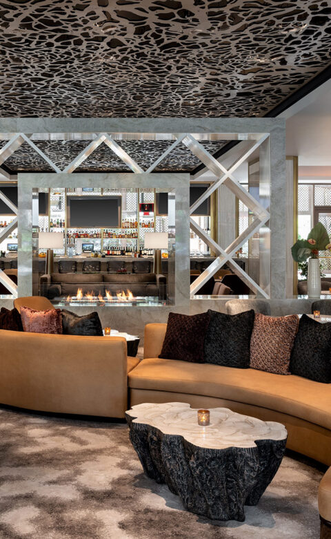 curved couches with cushions in lobby area